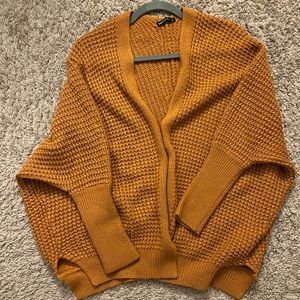 Small orange baggy cardigan from Shein